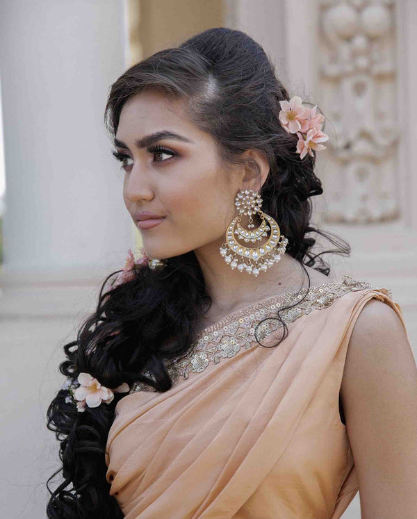 Model wearing Amin Chandbali crystal earrings - Romikas
