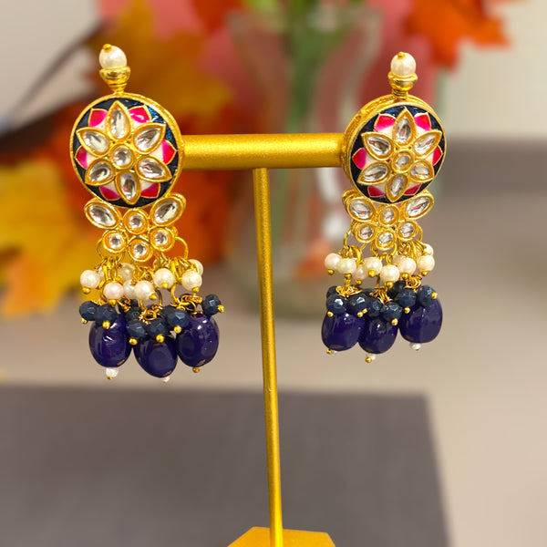 Blue earrings with meenakari and kundan with pearls and blue beads featuring Indian jewelry. Statement earrings inspired by Sabyasachi jewerly.