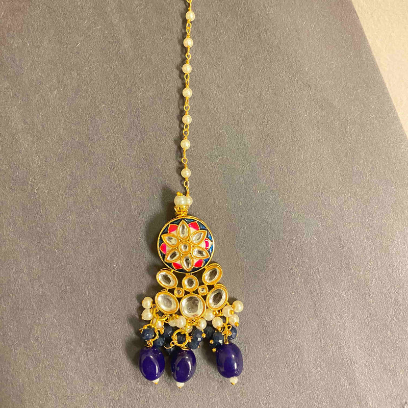 Blue maang tikka featuring pakistani jewerly online. Meenakari maang tikka with kundan, pearls and blue beads.