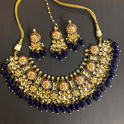 Blue Necklace Set with kundan, hand painted meenakari and pearls. Kundan necklace set featuring pakistani jewelry.  Statement necklace set with earrings and maang tikka. Blue meenakasri necklace set featuring desi jewelry.