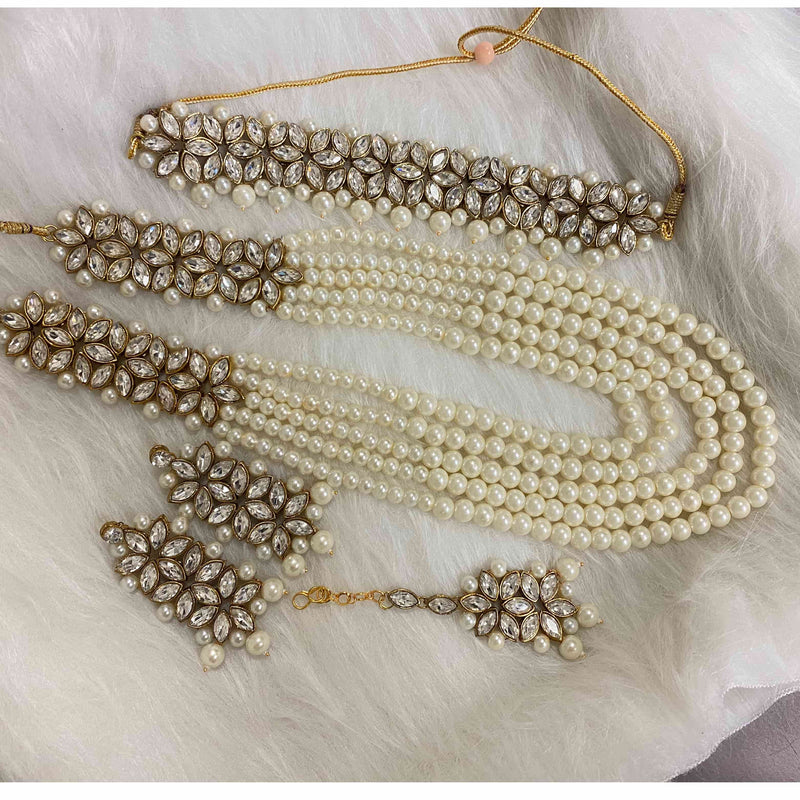 Pearl long mala, Kundan long mala with pearls. Indian necklace set with choker. long mala, earrings and maang tikka.