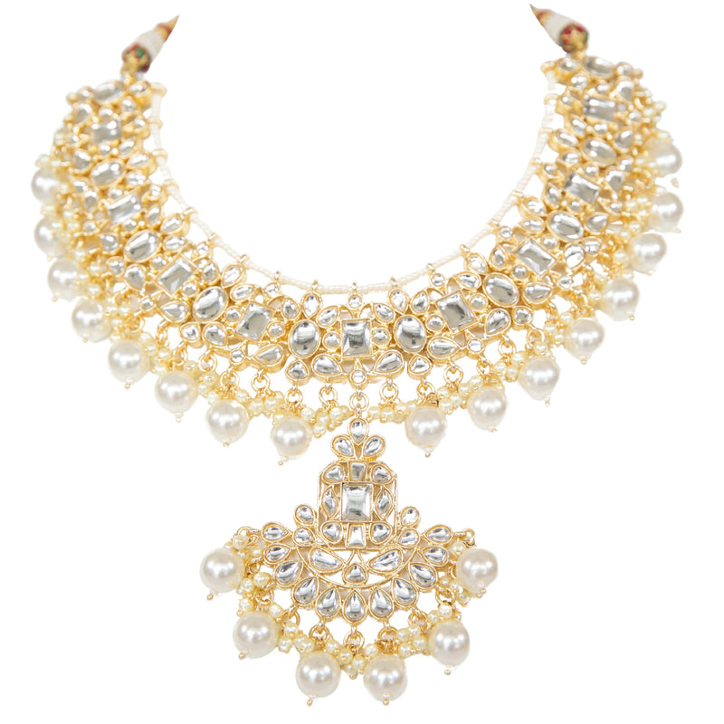 Indian Bridal Jewelry featuring a Neckale with kundn and pearls.