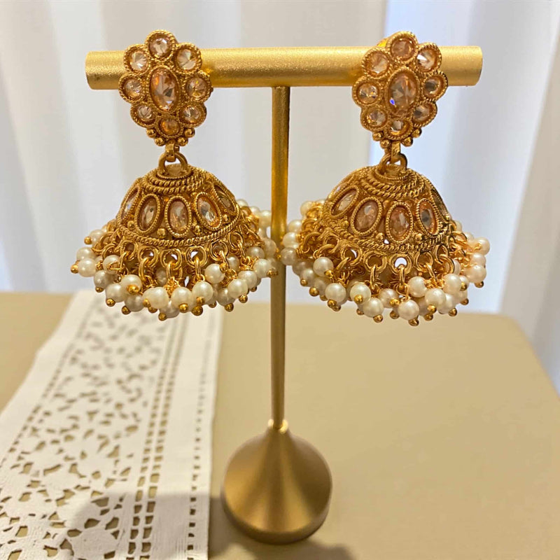 Traditional South Indian Guttapusalu temple jewelry jhumka earrings in antique gold with high-quality Polki stones and dense pearl clusters. Handcrafted design featuring cascading pearl bunches for a classic heritage look. Perfect for brides, festive wear, weddings, and cultural events. Elegant Polki and pearl detailing inspired by Andhra and Tamil craftsmanship.