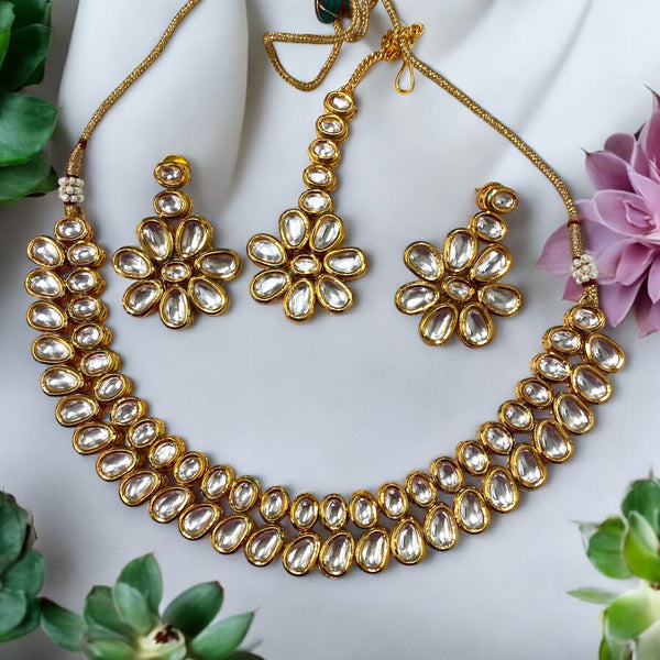 Indian Kundan Necklace Set with earring and maang tikka. Gold plated Indian necklace set from Indian jewelry store in Pleasanton, CA. South Asian Wedding Accessories | High-Quality Kundan Jewellery Online | Perfect for Festive Occasions