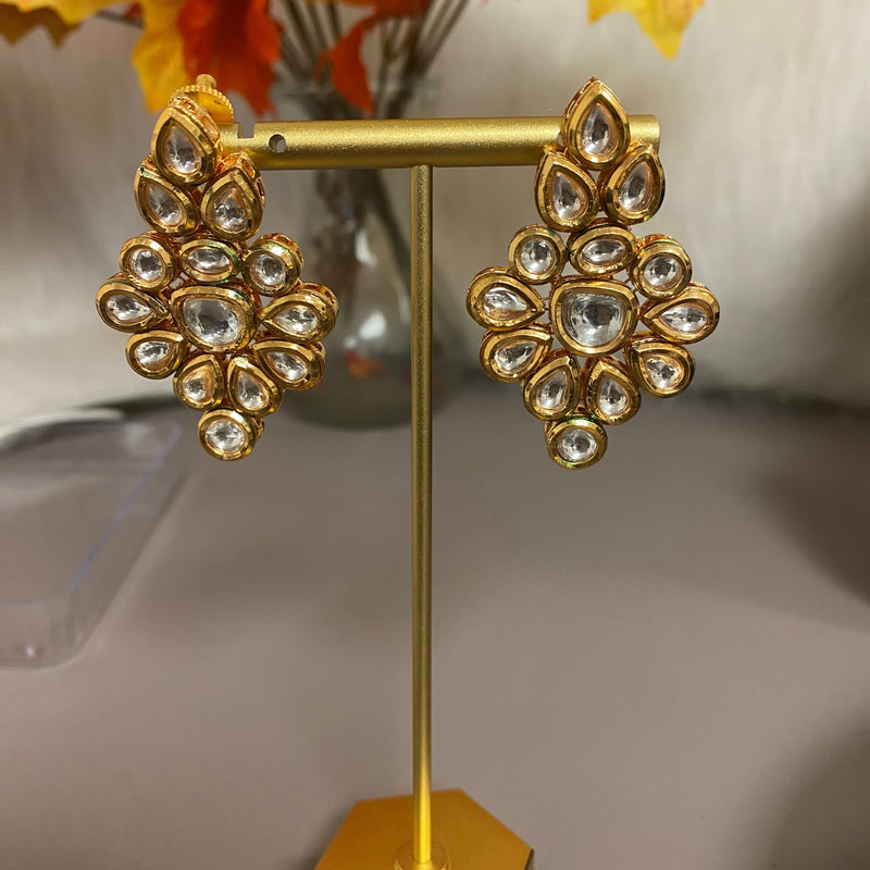 Statement kundan earring featuring pakistani jewelry online. Best Indian jewellry online on discount.