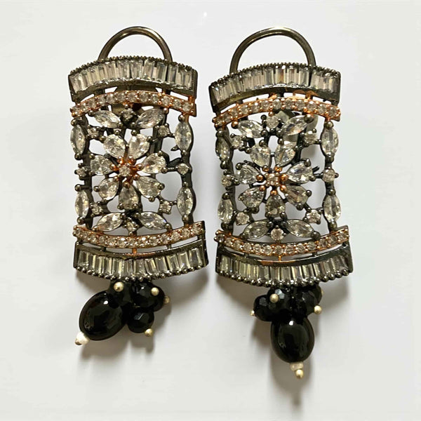 Elegant Black Pearl Mahima CZ Earrings with CZ Flowers | Indian jewelry with glossy black pearls and radiant cubic zirconia detailing | Gold-plated floral design offering a luxurious finish | Perfect for bridal wear, receptions, and festive celebrations | Lightweight, versatile, and beautifully handcrafted by Romikas Jewelry | A statement accessory exuding classic elegance and refined charm