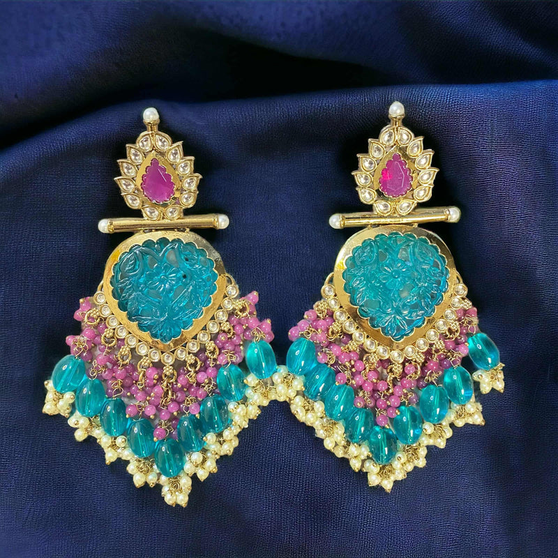 Featuring Indian Jewelry, this is a blue and pink color earring in gold with pearls.