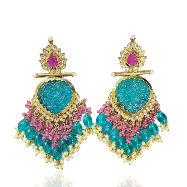 Inspired by bollywood jewelry online this is a desi jewelry blue pink gold plated kundan earrings with pearls.