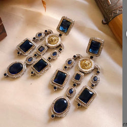 Sabyasachi-Inspired Blue CZ Long Earrings with Lion Face in Gold
Sapphire Blue Cubic Zirconia Earrings | Regal Indian Jewelry
Traditional Sabyasachi Style Earrings | Luxury Wedding Accessories
South Asian Bridal Jewelry | Gold and Blue Statement Earrings
Elegant Ethnic Jewelry for Festive Occasions | Majestic Lion Face Design
Timeless Indian Earrings | Exquisite Blue CZ Earrings