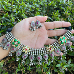 Silver Jewelry, Desi Jewelry, Pakistani Jewelry, Indian Jewelry. This is a necklace set with 92.5 silver coating featuring pachi kundan flowers and ghungroos.  The set comes with matching earrings.