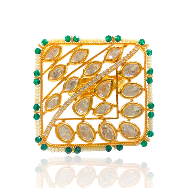 Featuring Indian Jewelry Online this is a rectangular ring with silver foil kundan and amercian diamongd with emerald and rice pearl ebads.