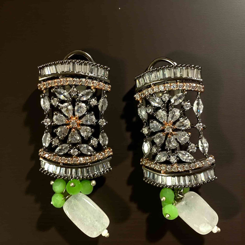 Parrot Green Pearl Mahima CZ Earrings with CZ Flowers | Elegant Indian jewelry featuring bright parrot green pearls and sparkling cubic zirconia floral motifs | Gold-plated earrings crafted with precision | Perfect for weddings, parties, and festive occasions | Lightweight and comfortable for long wear | Handcrafted by Romikas Jewelry | A beautiful blend of traditional Indian design and modern elegance, adding a pop of color and sophistication to any outfit