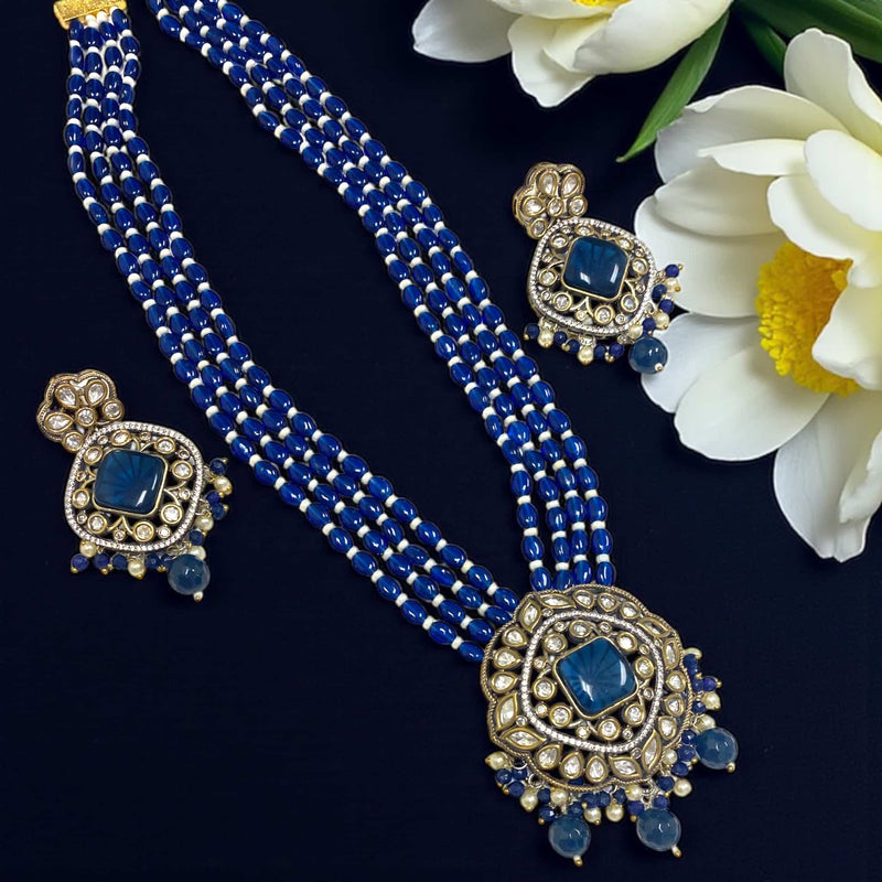Blue Kundan and CZ Long Necklace Set with Pearls | Traditional Indian Jewelry | Four-Layer Blue Beaded Necklace with Intricate Kundan Pendant | Silver Foiling and High-Quality Cubic Zirconia | Matching Earrings with Blue Stones and Pearls | Elegant Ethnic Jewelry for Weddings, Parties, and Festive Occasions | Royal Blue Statement Necklace Set in Gold Finish
