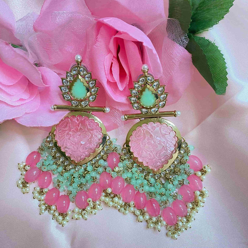 Gold plated mint ponk kundan earrings with pearls representing Indian jewelry online usa.