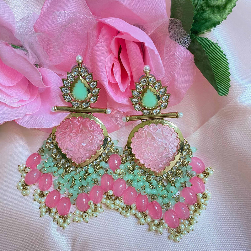 Gold plated mint ponk kundan earrings with pearls representing Indian jewelry online usa.