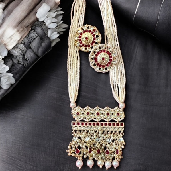 Long Pearl Mala with Kundan and Ruby Stones | South Asian Bridal Jewelry | Elegant Pearl Necklace with Intricate Kundan Design | Traditional Jewelry for Weddings and Festivals | Statement Long Necklace with Ruby Accents | Ethnic Jewelry for Special Occasions.