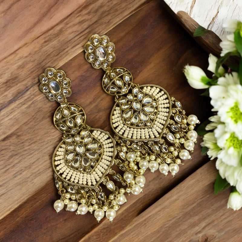 Pearl Chandbali Earrings | Traditional South Asian Jewelry | Crescent-Shaped Earrings with Pearls | Gold Finish Ethnic Earrings |Wedding and Festive Accessories | Elegant Bridal Jewelry | Romikas Kundan Pearl Earrings/Matt Gold Earrings/Kundan Chandbalis/Statement Earrings/Pearl Earrings/Kundan Earrings/Gift For Her/Chandbali for Indian and Pakistani Outfits |