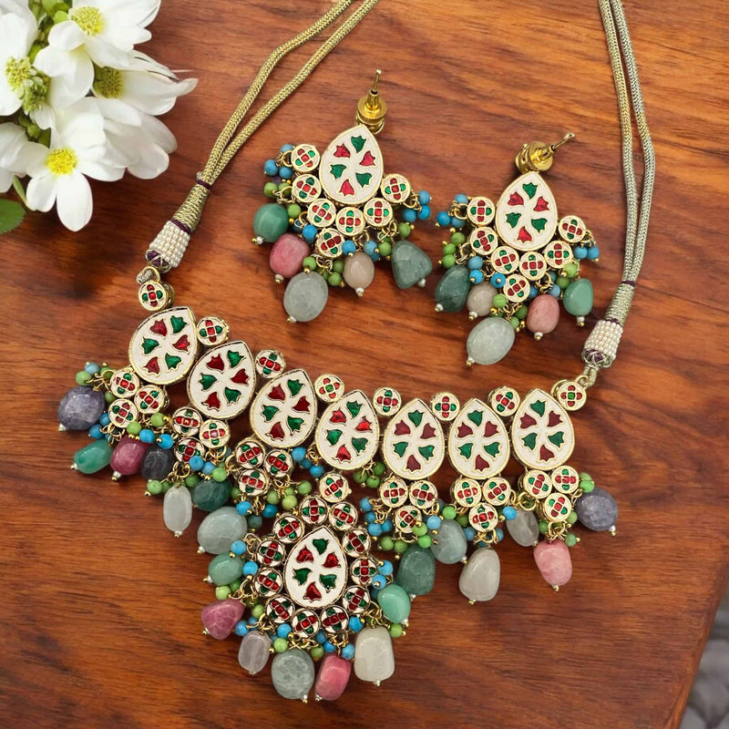 Back side of multicolor Kundan necklace set with detailed meenakari work | Hand-painted floral meenakari in green and gold on gold-plated base | Traditional Indian jewelry craftsmanship | Reverse view of bridal Kundan choker set with matching earrings | Ethnic jewelry for weddings and festivals | South Asian necklace set with artisan meenakari detailing | Luxury handmade Indian jewelry