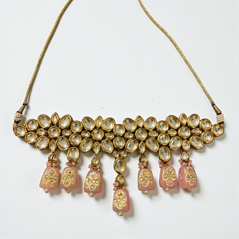 Traditional Kundan choker necklace featuring pink Monalisa beads with elaborate back meenakari work, gold finish, showcasing superior Indian jewelry artistry. Perfect for bridal wear, weddings, festivals, and ethnic occasions, this premium necklace offers a striking statement piece that enhances cultural attire with elegance and style, combining intricate Kundan design, vibrant beads, and luxurious craftsmanship for timeless South Asian festive fashion.