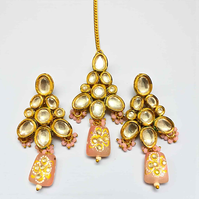 Stunning Kundan earrings and maang tikka set featuring pink Monalisa beads with intricate back meenakari work, gold-plated finish, reflecting traditional Indian jewelry craftsmanship. Ideal for weddings, bridal events, festivals, and ethnic occasions, this elegant set combines premium quality, vibrant beads, and detailed design, making it a perfect accessory to enhance South Asian bridal and festive attire with sophistication and timeless charm