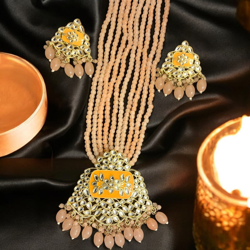 Exquisite long Kundan necklace set with peach beads and gold plating | Includes matching earrings | Perfect for traditional Indian attire, weddings, and celebrations | Elegant Kundan work adds timeless charm | Ideal statement jewelry l