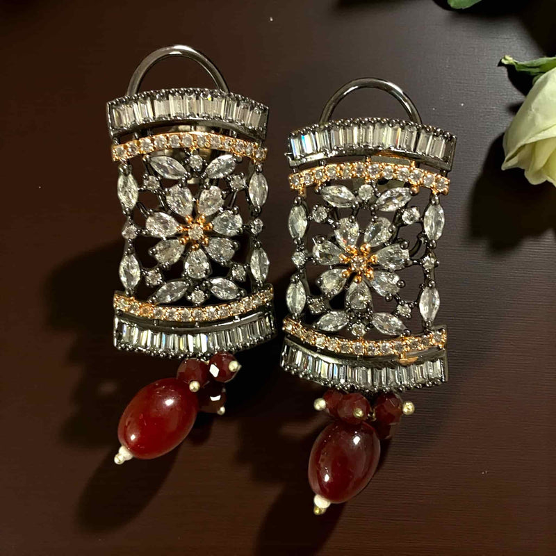 Red Pearl Mahima CZ Earrings with CZ Flowers | Indian jewelry featuring deep red pearls and sparkling cubic zirconia floral motifs | Gold-plated earrings matching the long necklace | Perfect for weddings, festive occasions, and bridal ensembles | Elegant traditional design with modern sophistication | Lightweight, premium-quality craftsmanship by Romikas | Adds a touch of regal charm and completes the Red Pearl Mahima CZ Necklace Set beautifully