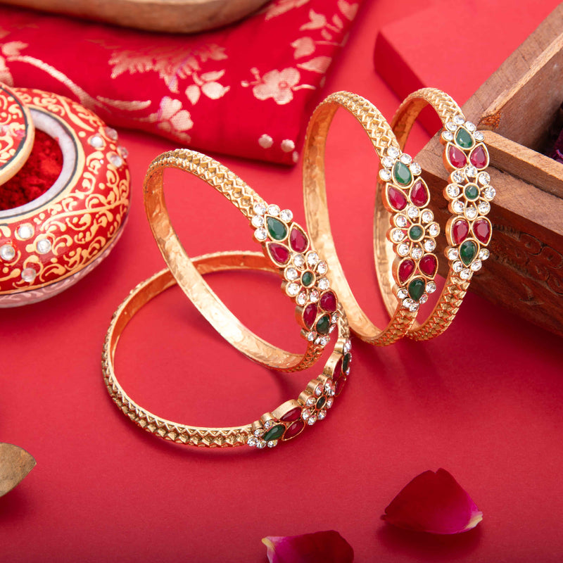 Red and Green Indian Jewelry Kundan Bangles with gold plating.