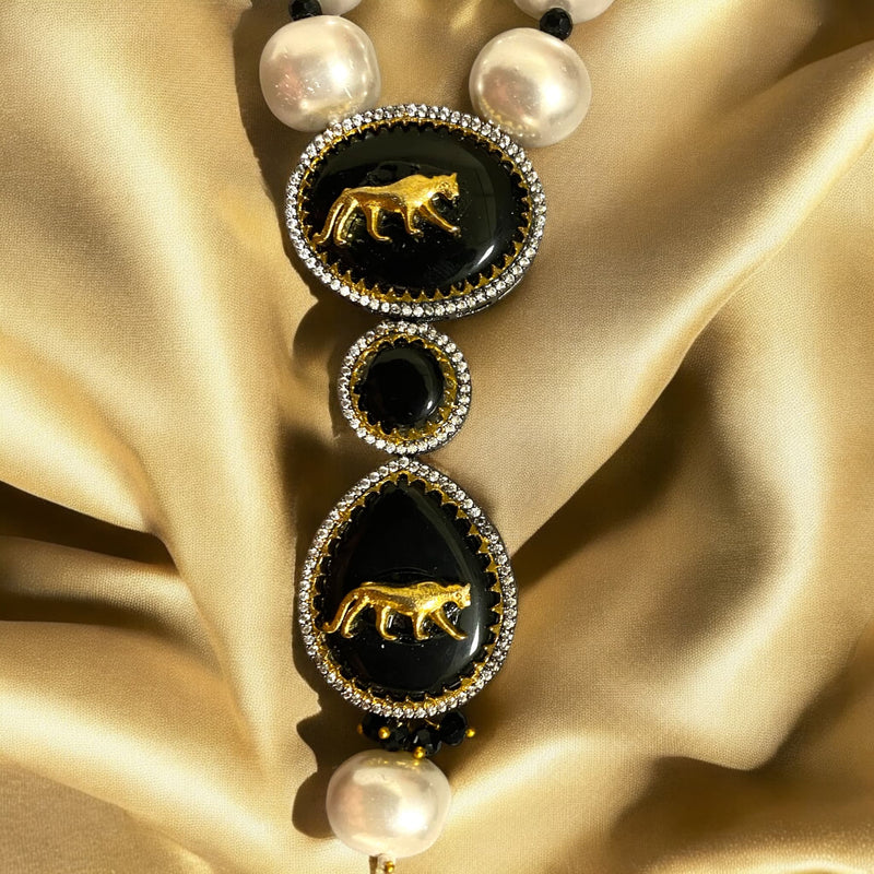 Sabyasachi inspired pearl necklace set with barooq pearls, black stone, cubic zirconia and tiger motif from Online Indian Jewelry Store.