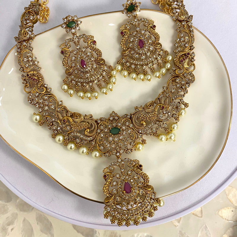 Gold Plated Necklace Set with Ruby and Emerald Stones | American Diamond and Pearl Jewelry | Traditional South Asian Necklace for Brides | Indian Bridal Jewelry Set | Festive and Wedding Jewelry | Intricately Designed Ethnic Jewelry | Statement Necklace for Special Occasions