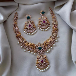 Gold-Plated CZ Necklace Set with Pearls | Luxurious Cubic Zirconia Necklace Set | Elegant Indian Bridal Jewelry | Gold and Pearl Necklace Set | South Asian Wedding Accessories | Traditional Indian Necklace Set | Pearl-Embellished Jewelry | Gold Plated Necklace with CZ Stones | Ethnic Jewelry for Festive Occasions | Timeless Indian Necklace Set | Sophisticated Gold and Pearl Jewelry | Bridal Necklace with Cubic Zirconia | Classic Indian Jewelry for Weddings | Gold-Plated Necklace with Pearls and CZ Stones | 