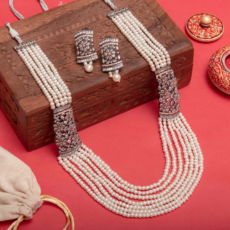 Online Desi Jewelry featuring pearl long necklace with CZ broaches on both sides. Perfect for Indian and Pakistani jewelry.