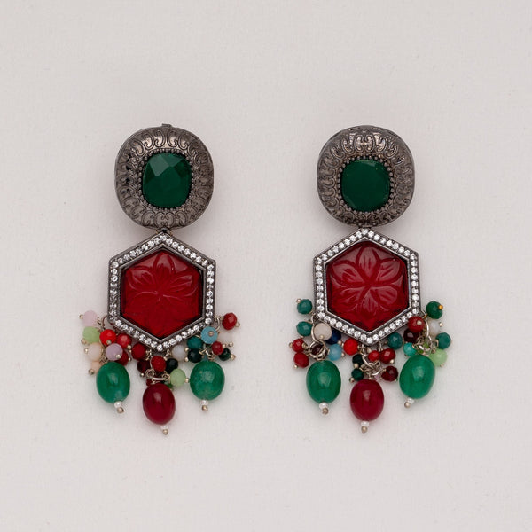 Indian Jewelry featuring Ruby Carved Stone earrings with CZ, Ruby and Emerald Stones. Perfect for Pakistani and Desi Jewelry.