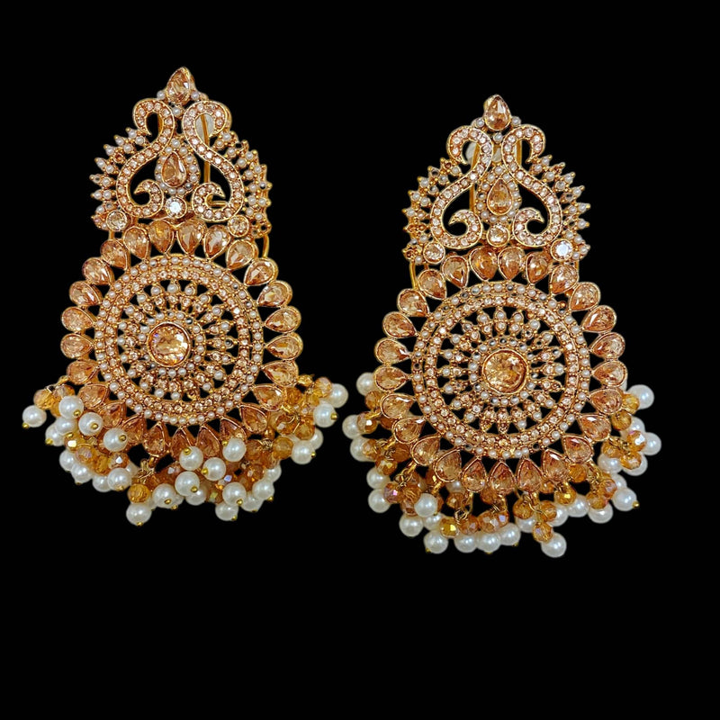 Champagne gold earrings with delicate pearl accents | Intricate design with a luxurious finish | Perfect for weddings, festive occasions, and elegant soirées | A timeless addition to South Asian bridal jewelry | Lightweight yet statement-worthy earrings that pair beautifully with sarees, lehengas, and ethnic attire | Elevate your look with these exquisite pearl earrings, designed for grace and sophistication.