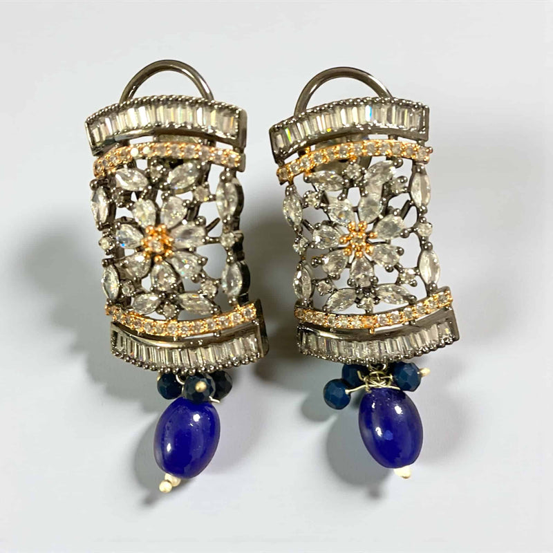 Blue Pearl Mahima CZ Earrings with CZ Flowers | Indian Jewelry | Elegant gold-plated earrings featuring blue pearls and sparkling cubic zirconia floral design | Perfect for weddings, parties, and festive occasions | Traditional yet modern Indian earrings that complement sarees and lehengas | Lightweight, premium-quality CZ and pearls | Romikas Jewelry | Timeless statement earrings with refined craftsmanship and graceful allure