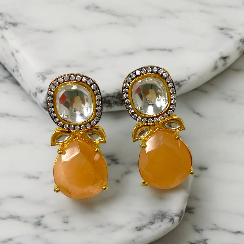 Stunning Peach Shibani Kundan Earrings featuring intricate uncut Kundan, sparkling American Diamonds, and elegant peach Monalisa beads in gold plating. Perfect for adding a touch of elegance to weddings, festivals, and traditional celebrations.