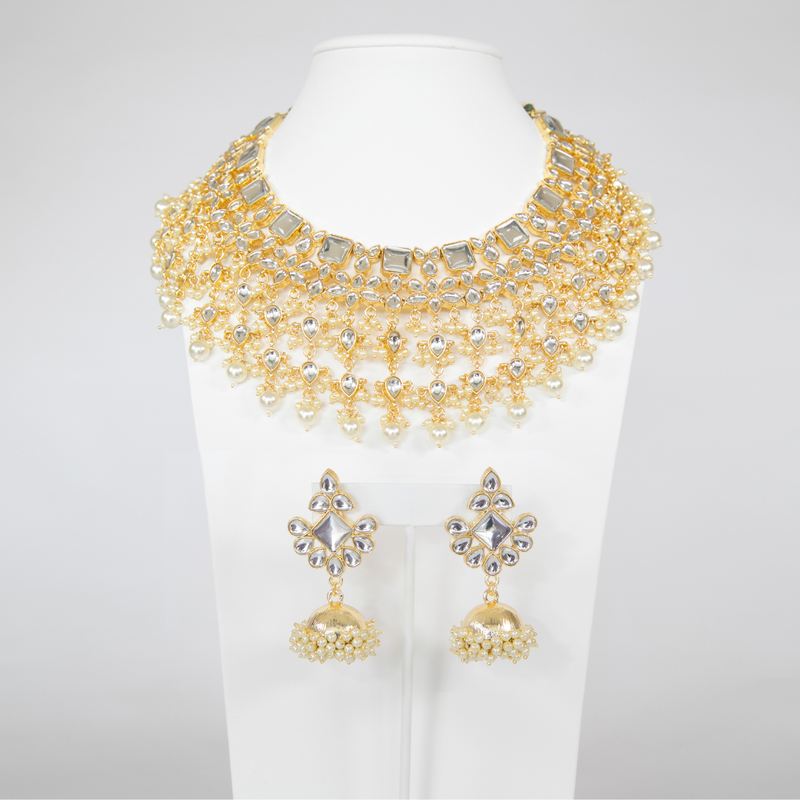 Indian Jewelry featuring Kunan and Pearl Necklace Set on White Gold with Jhumkas.