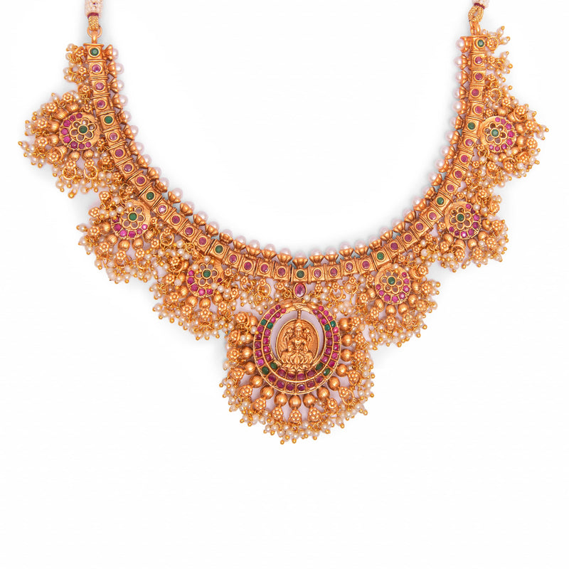 Indian Temple Necklace In Matt Gold with Red And Green Kemp Stones for Online Indian Jewelery on discount.