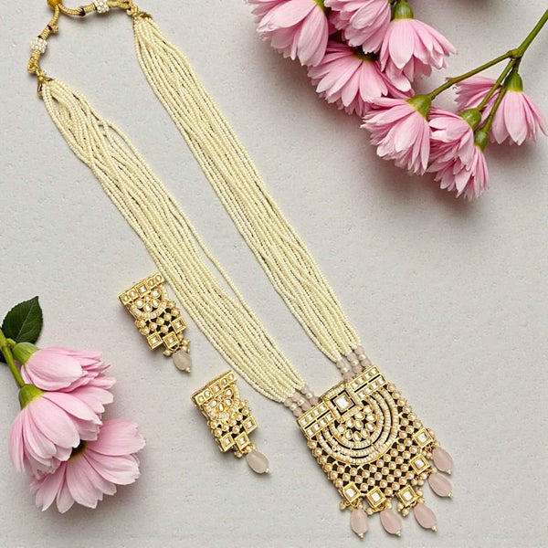 Pearl long necklace set featuring multi-layer pearls, intricate Kundan pendant, and soft pink Monalisa stones paired with matching Kundan earrings. Elegant Indian bridal jewelry perfect for weddings, receptions, and festive wear. Traditional pearl and Kundan design ideal for sarees, lehengas, and party outfits.