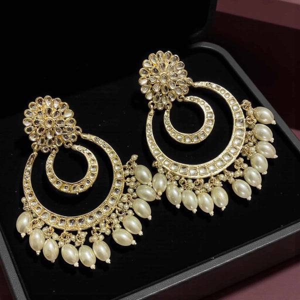 Gold plated Kundan chandbali earrings with pearls, handcrafted in a traditional Indian design. Elegant and lightweight, perfect for weddings, parties, and festive wear.