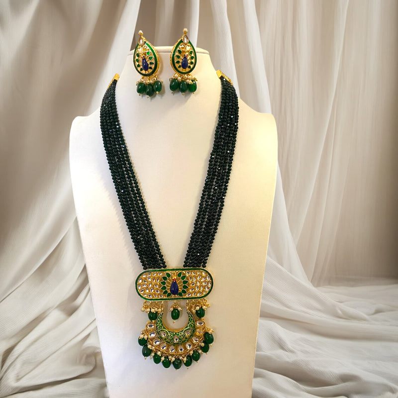 Green Long Necklace Set from Online Indian Jewelry store in Pleasanton. Long Kundan Necklace Set with earrings showcasing a a meenakari peacock.