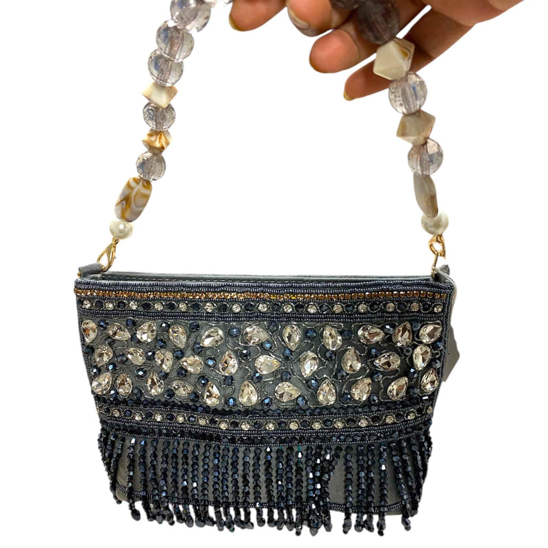 Luxury grey beaded purse with detailed stone work and beaded crystal handle from Romikas Jewelry Shop. Beautiful handmade Indian clutch for women, ideal for parties, weddings, and cultural celebrations. A perfect ethnic accessory for elegant and festive outfits.