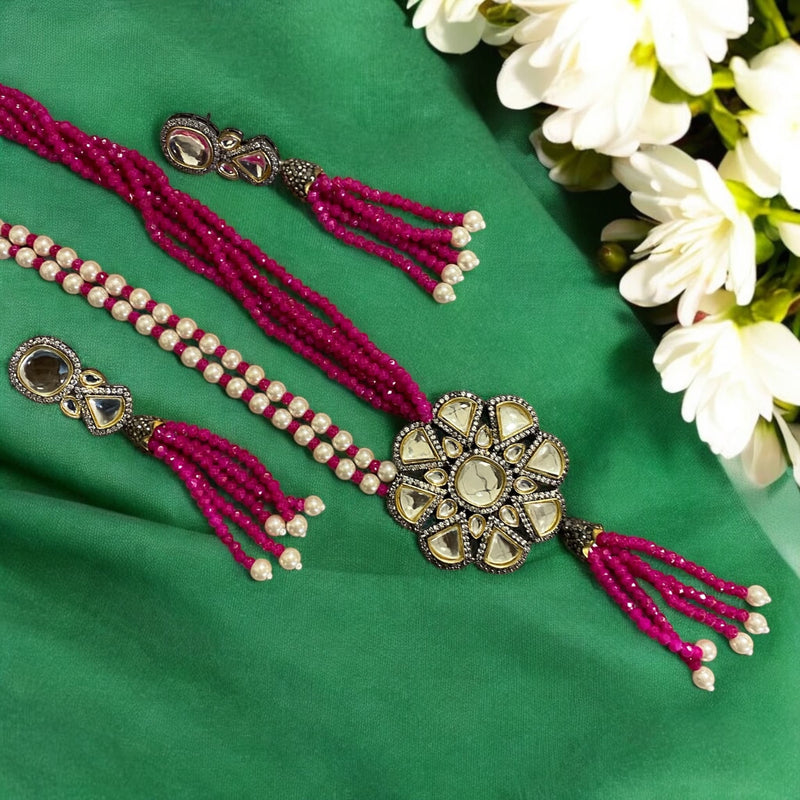 Hot pink long Kundan necklace set with matching earrings, featuring silver-foiled Kundan stones, hot pink beads, and elegant pearls. A traditional Indian jewelry piece perfect for weddings, bridal wear, and festive occasions.