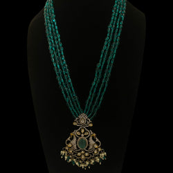 Seagreen bead long mala necklace set with silver foil Kundan and cubic zirconia in Victorian (Mangat Rai) finish | South Asian jewelry | Features dual peacock motifs with turquoise stone center | Includes matching earrings |