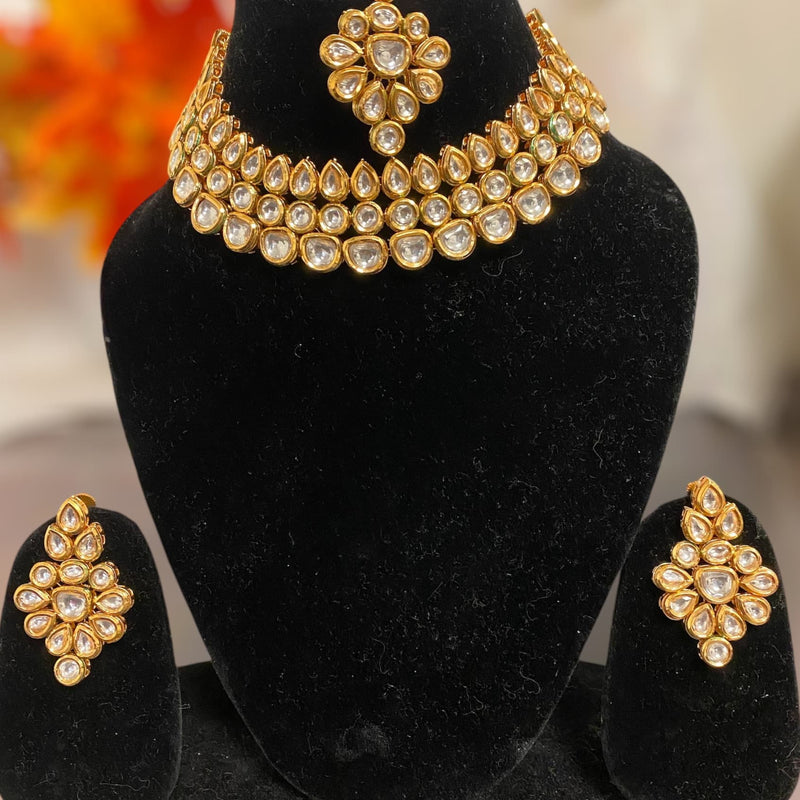 Sabyasachi inspired necklace set, 
Gold plated kundan necklace set, Necklace with maangtikka and earring featuring desi jewelry.