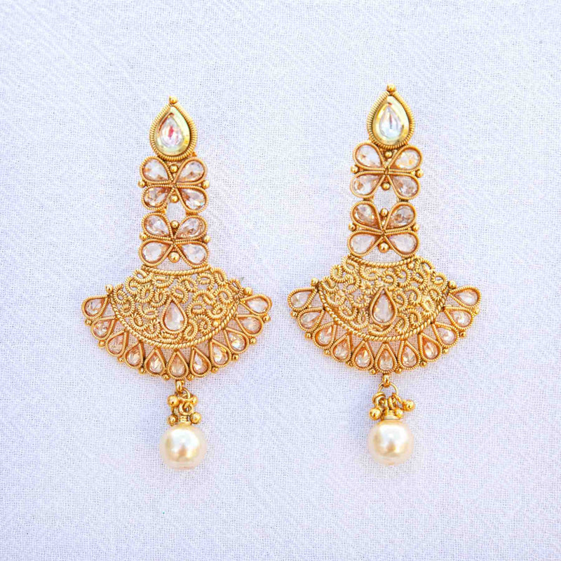 Clear Zoya earrings: kundan, polki, pearls - Romikas