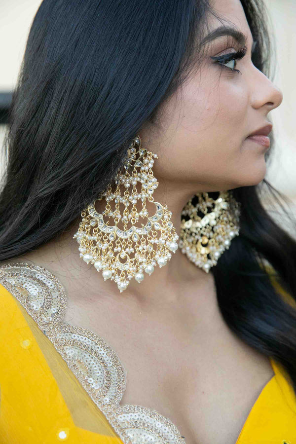 Model wearing Navya earrings - Romikas