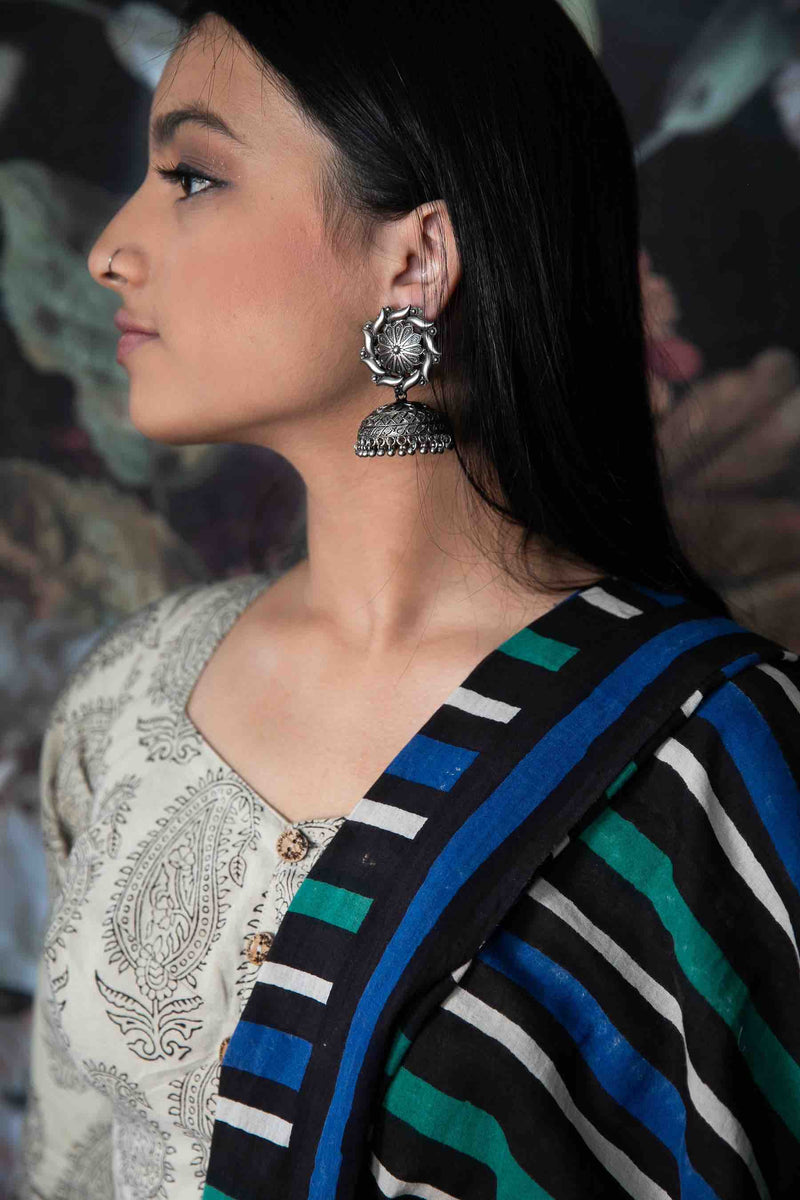 Model wearing Rangeela jhumka earrings - Romikas