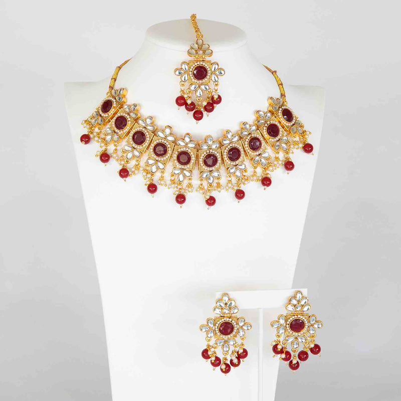 Red Amrita jewelry set: choker, earrings, maang tikka - Romikas