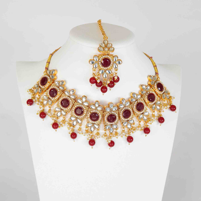 Red Amrita jewelry set: necklace, maang tikka - Romikas